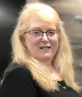 Published headshot of Debby Briggs