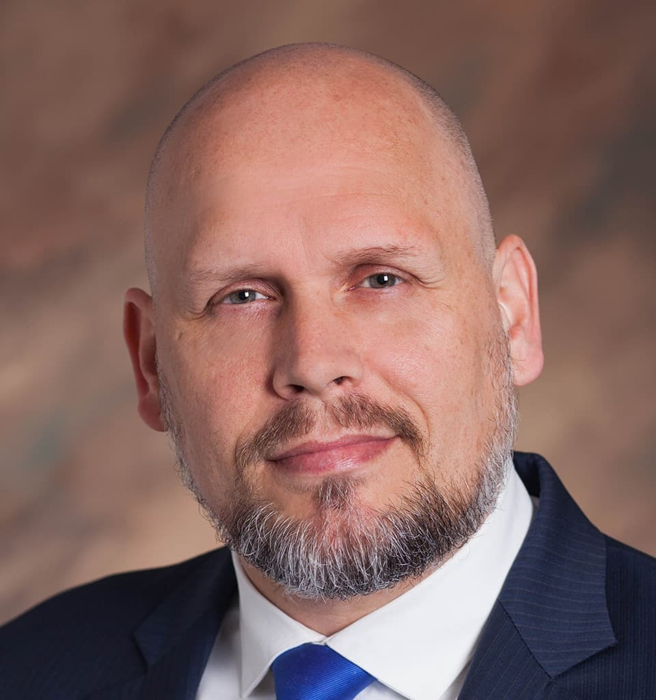 Published headshot of Gregory Barnes