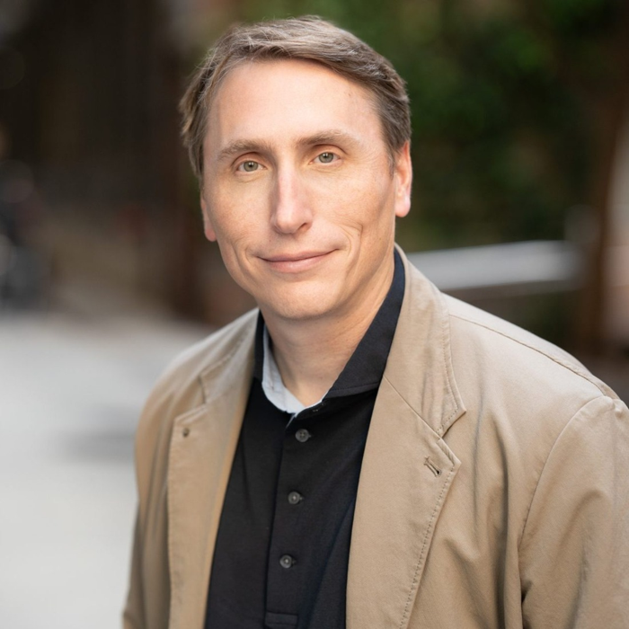 Published headshot of James Nettesheim